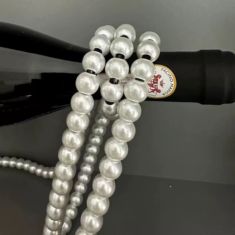 Suspended Pearl Bottle Holder 